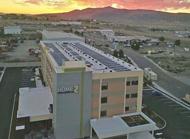 Home2 Suites hotel in Elko, Nevada with east-west rooftop solar racking